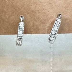 2/$15 Silver tone hoop earrings w/3round crystal stones on each hoop spaced out